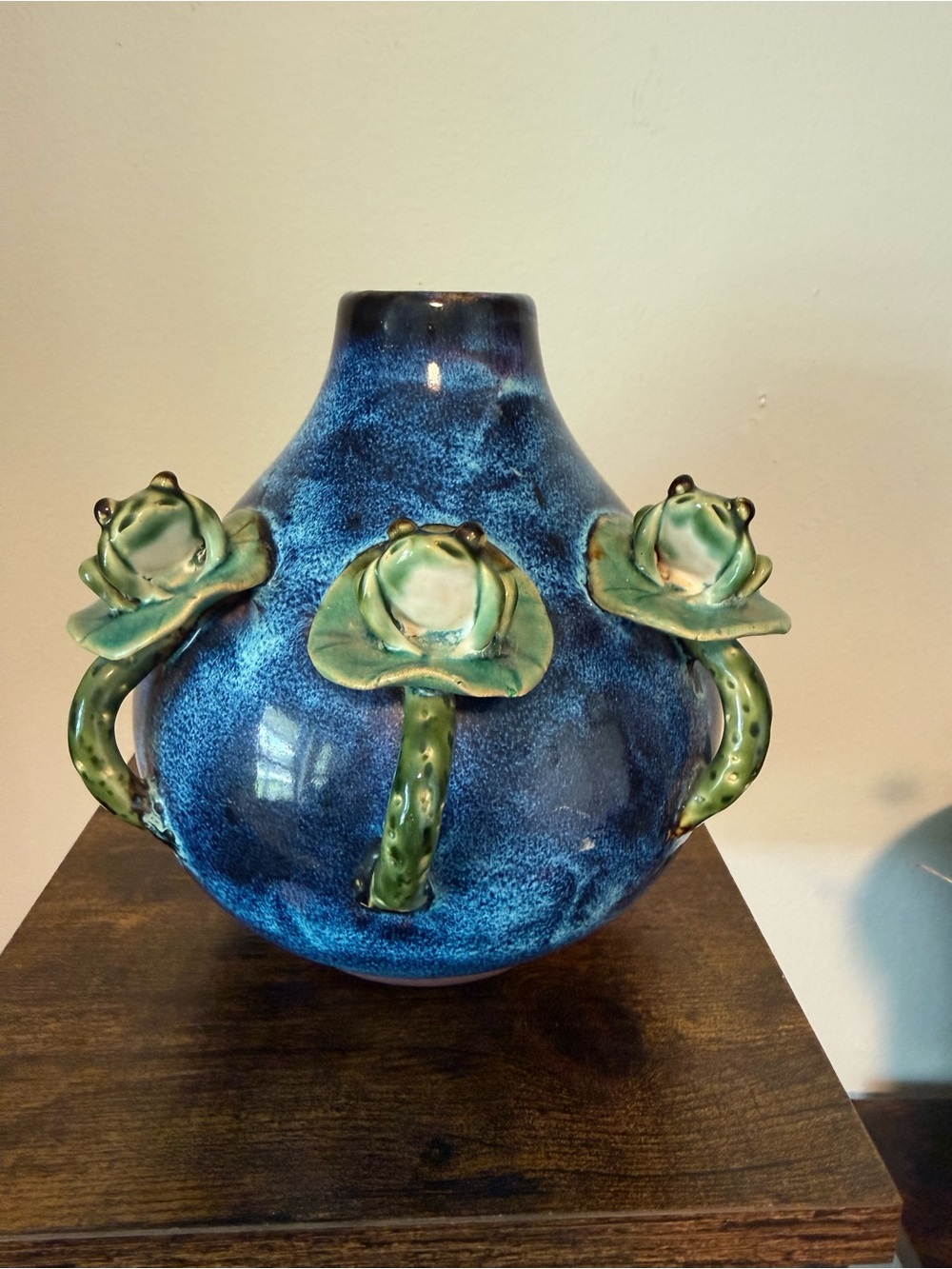 Blue Ceramic Decorative Vase with Green Floral Accents
